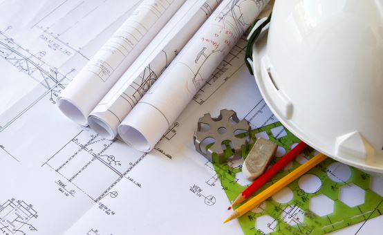 Engineering Procurement and Construction Management EPCm with technical drawings and safety equipment
